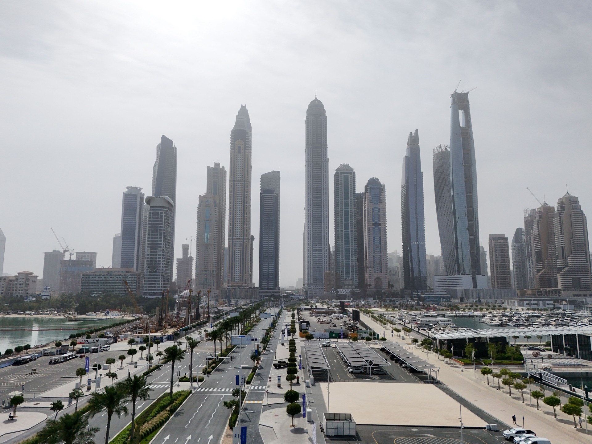 Modern Skyscrapers of Dubai Marina under Hazy Sky